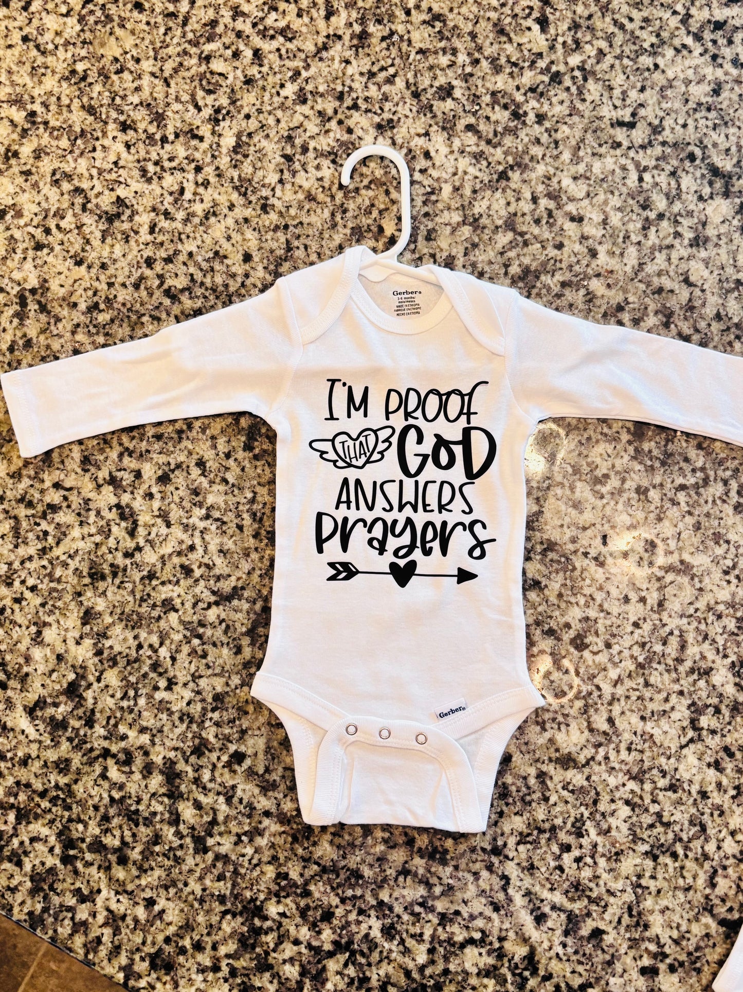 I'm Proof that God Answers Prayers Baby Onesie